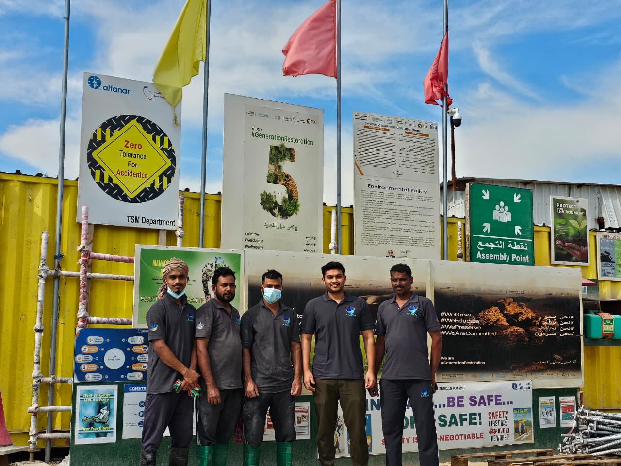 AAMCO project team assembled at an alfanar site safety area